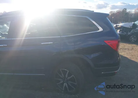 2021 Honda Pilot Awd Touring 8 Passenger z USA, uszkodzony, nr VIN 5FNYF6H94MB003272